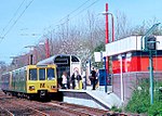 A Tyne & Wear Metro train heading for South Shields stopping at Kingston Park station