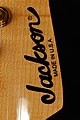 Jackson PC-1 logo on a Strat-type headstock