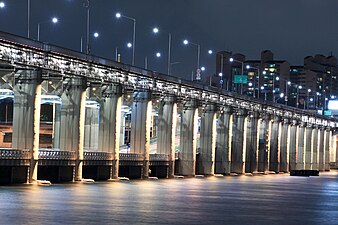 View of the bridge from the water at night (2009)