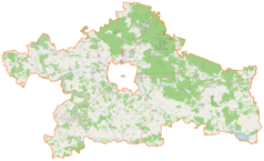 Mapa konturowa powiatu białostockiego, blisko centrum u góry znajduje się punkt z opisem „Kościół Przemienienia Pańskiego”