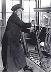 A signalwoman in a Great Central cabin near Birmingham, England, in 1918