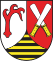 Wappen des ehemaligen Landkreises Quedlinburg mit gekreuzten Kredenzmessern