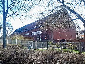 Blick auf die Kulturscheune von der Landsberger Allee aus