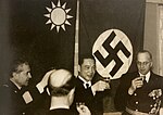 The flag used indoors next to the flag of Nazi Germany in a state banquet.