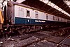 A BR Mark 1 composite sleeping car in the LNWR carriage sheds at Crewe in the mid-1970s