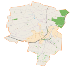 Mapa konturowa gminy Charsznica, blisko prawej krawędzi u góry znajduje się punkt z opisem „Tunel pod Białą Górą”