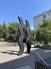 Photograph of Keith Wilson's sculpture 'Sign for Art' on the University of Leeds campus