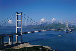 A large concrete suspension bridge.