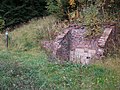 Doppelmundloch von Schacht 30 („Neues Deutschland“), zwei Eingänge von Schacht „Querschlag 4“ sowie Betonstützmauern der Wismut-Bunkeranlage am Eisenberg