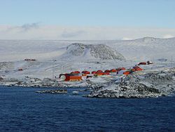 The station is the building atop on the left