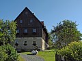 Wohnstallhaus und Scheune eines Dreiseithofes