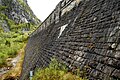 The dam was dressed on both sides with approximately 20000 m2 of hand cut granite stone, the largest of its kind in Norway.