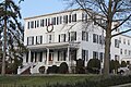 The Douglaston Club, built c. 1819 as the Van Zandt manor house and expanded in the early 1900s to serve as a private club.