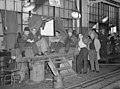 Image 18Union members occupying a General Motors body factory during the Flint Sit-Down Strike of 1937 which spurred the organization of militant CIO unions in auto industry (from History of Michigan)