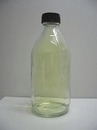 Sample of chlorine gas in a glass bottle