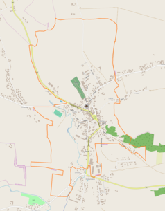 Mapa konturowa Działoszyc, w centrum znajduje się punkt z opisem „Cmentarz żydowski w&nbsp;Działoszycach”