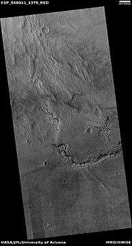 Wide view of upper plains unit breaking down into brain terrain, as seen by HiRISE under HiWish program