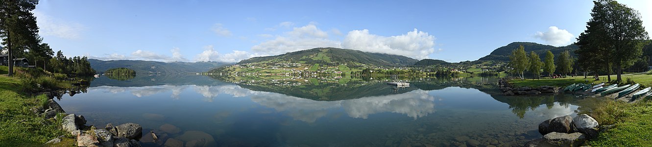 Panorama of Hafslovatnet with the village Hafslo visible across the lake in the center of the image