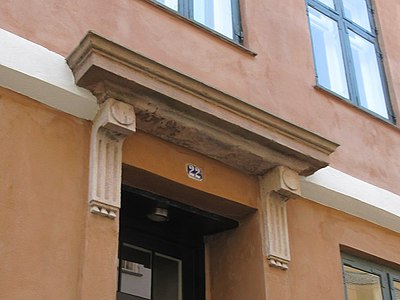 Close-up of the hood mould above the main entrance