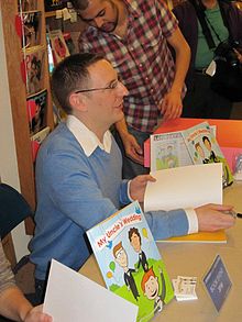 Rosswood signing copies of My Uncle's Wedding at the book release