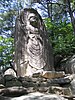 The carved image of the standing Buddha (마애불입상) on Gayasan, Hapcheon, South Korea.