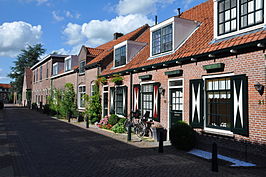 Blik in de Schoolstraat vanuit de Vrouwenhuisstraat