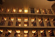 Looking up at rows of bookcases