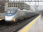 An Acela train led by locomotive number 2035 makes a stop at New Haven Union Station in 2007