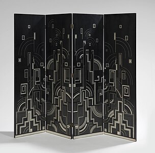 Screen by Gaston Suisse, Black Chinese lacquer and graphite inlays. Abstract geometric decor in silver lacquer.circa1925,[21] Exposition: 1925, Quand L'art Déco séduit le monde.Cité de l'architecture, Palais de Chaillot, Paris