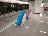 Dolphin couple stools, located on the platform