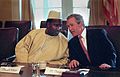 President George W. Bush talks with Mali President Alpha Konare during his meeting with African presidents in the Cabinet Room.