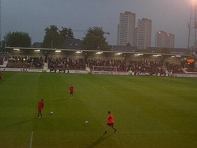 Players training before a game at Griffin Park