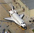 Can artificial objects be considered "cute"? Space Shuttle Discovery looks pretty adorable here.