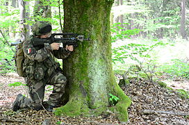 A French soldier provides security with a FAMAS in Germany in 2014