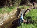 The headwaters of the Water of Leith are diverted around Sullivan's Dam in a series of concrete water races