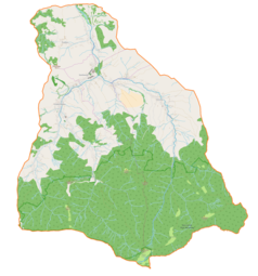 Mapa konturowa gminy Niedźwiedź, na dole po prawej znajduje się punkt z opisem „Pustak”