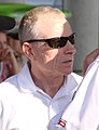 Mark Martin talks with crew members before signing autographs at Iowa Speedway on July 13, 2007.