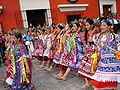 Oaxacan women on parade in traditional apparel