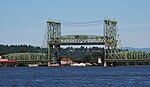 Green steel lift-span bridge with lift span raised