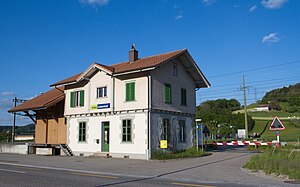 Two-story building with gabled roof