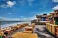 Image 7Cox's Bazar in Bangladesh known for its wide sandy beach, is believed to be the world's longest (120 km) natural sandy sea beach. It is located 152 km south of Chittagong. The photo features a beach restaurant at Cox's Bazar. Photo Credit: Xalan mustafa