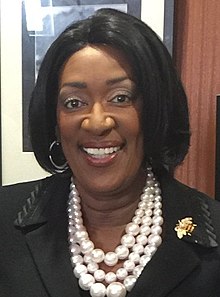 head shot of African American woman with pearls