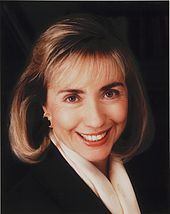 Formal color portrait of a middle aged Clinton