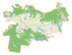 Mapa konturowa gminy Gietrzwałd, na dole znajduje się owalna plamka nieco zaostrzona i wystająca na lewo w swoim dolnym rogu z opisem „Sarąg”