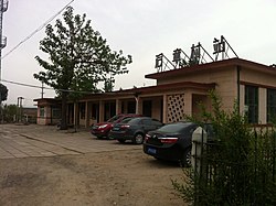Houzhangcun Station within the town, 2015