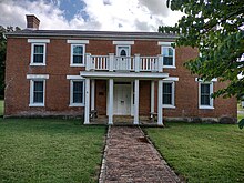 Two story red brick building