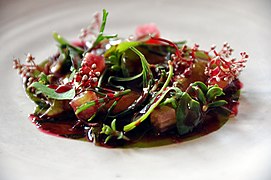 Raw prawns with seaweed, rhubarb and herbs