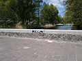 de M. Justbrug (in de Van Nijenrodeweg), links van het water loopt de Van der Boechorststraat.