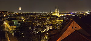 Zagreb at night, with a wide street and several tall buildings