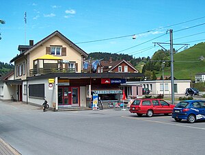 Two-story building with gabled roof